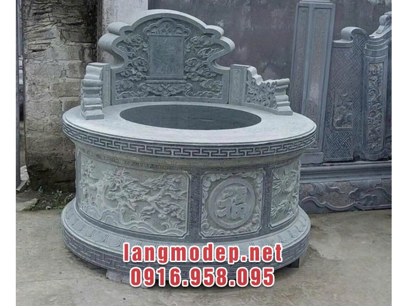 Mẫu mộ tròn đá xanh rêu nguyên khối